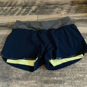 Navy blue running shorts with built in spandex